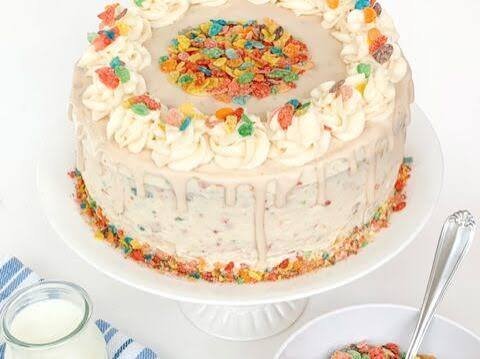 Fruity Pebble Cereal Milk Poke Cake